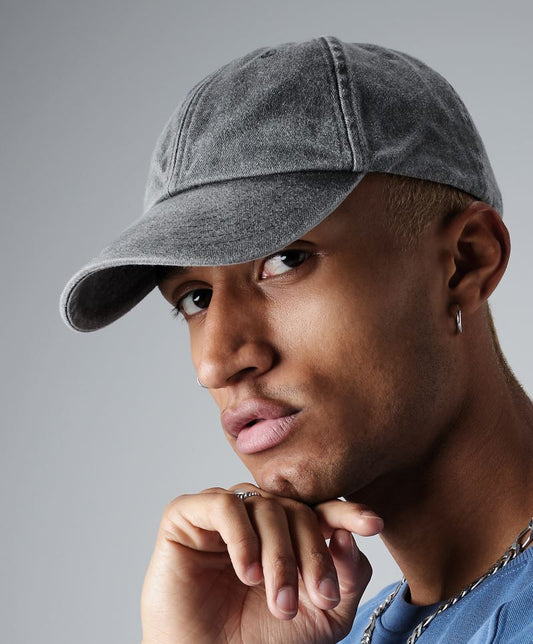 Sendinta medvilninė kepurė su snapeliu